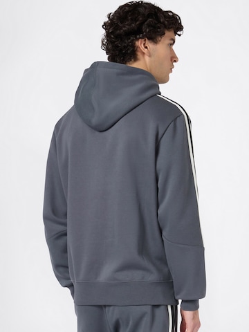 Felpa di Champion Authentic Athletic Apparel in grigio