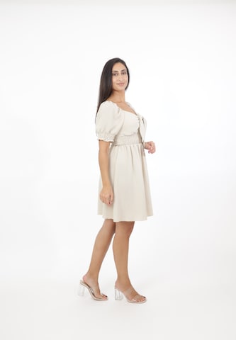 Abito di Elara in beige