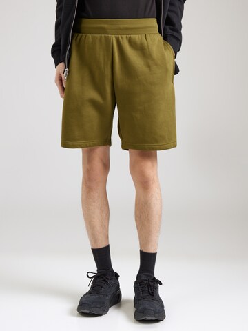 THE NORTH FACE Loose fit Trousers 'Easy' in Green: front