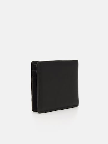 Carhartt WIP - Cartera 'Vegas' en negro