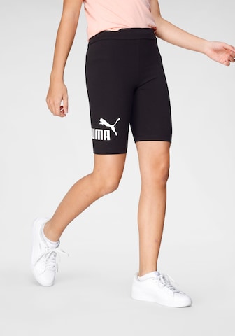 PUMA Skinny Workout Pants in Black: front