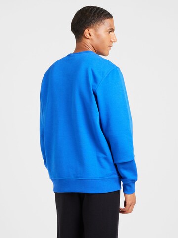 Felpa di Champion Authentic Athletic Apparel in blu