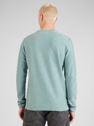 QS - Pullover em verde