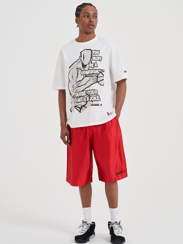 AND1 Loosefit Funkční kalhoty – červená