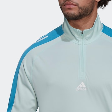 ADIDAS SPORTSWEAR - Camisa funcionais em azul