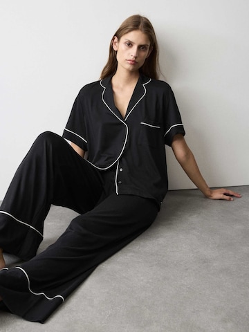 Pigiama di Marks & Spencer in nero