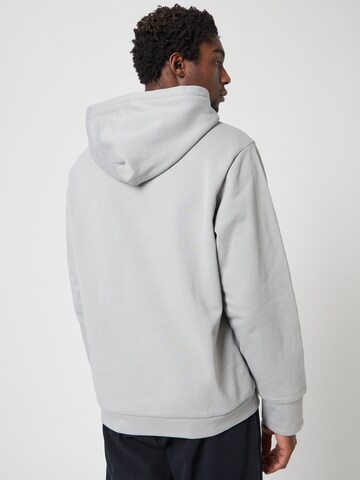 ABOUT YOU x Louis Darcis - Sudadera en gris