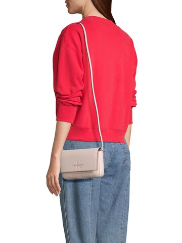 Calvin Klein Jeans Crossbody bag in Pink
