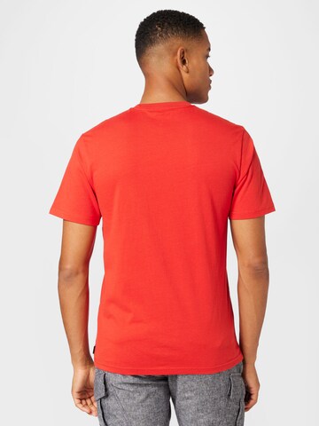 RIP CURL Funkcionalna majica | rdeča barva