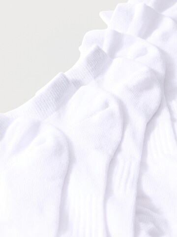 Chaussettes de sport ASICS en blanc