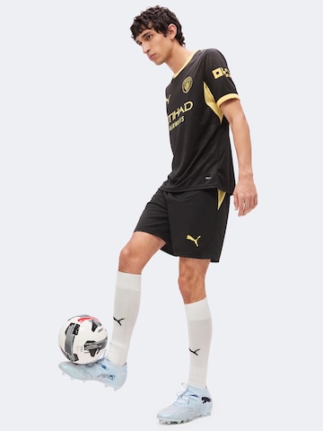 PUMA Loosefit Urheiluhousut 'MCFC' värissä musta