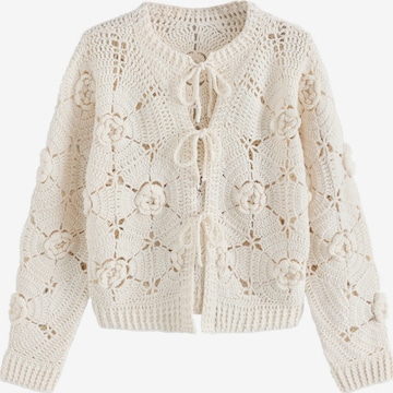 Next Neuletakki värissä beige: etupuoli