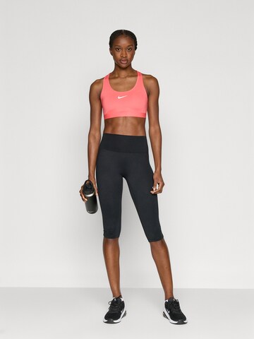 NIKE Bustier Športni nederček 'SWOOSH' | oranžna barva