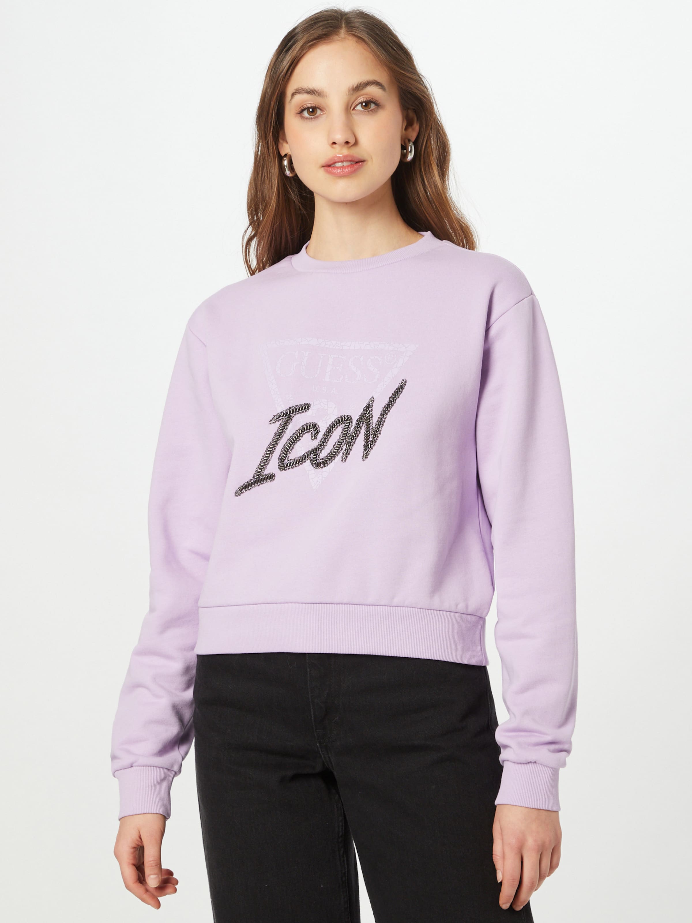 purple guess sweatshirt