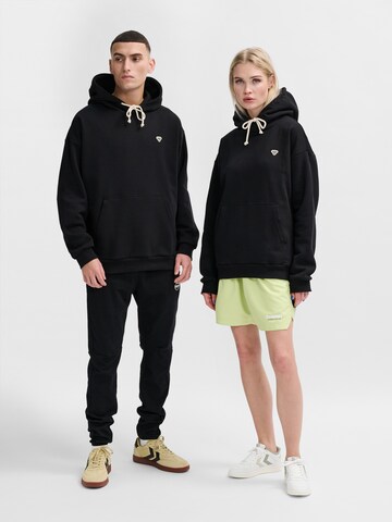 Hummel Sweatshirt 'Bee' in Zwart