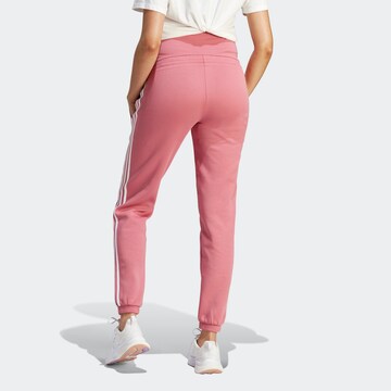 ADIDAS SPORTSWEAR Zwężany krój Spodnie sportowe w kolorze różowy
