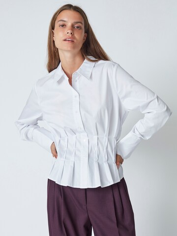 Chemisier 'Poppy' co'couture en blanc : devant