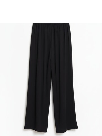 WEARABLE STORIES - Loosefit Pantalón 'Ellie' en negro