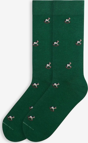 Von Jungfeld Socks 'mit Weihnachtsmotiven' in Green: front