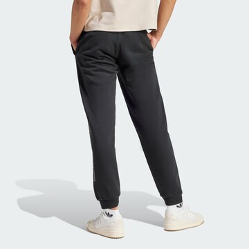 ADIDAS ORIGINALS Regular Workout Pants 'Future Road' in Black