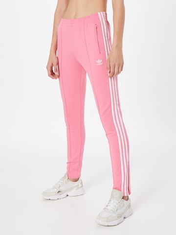 ADIDAS ORIGINALS Slim fit Pants in Pink: front