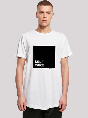 T-Shirt 'SELF CARE' F4NT4STIC en blanc : devant