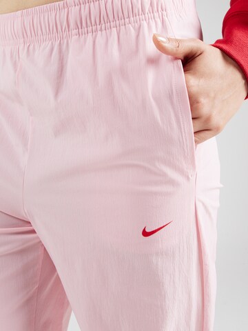 Nike Sportswear Tapered Hose in Pink