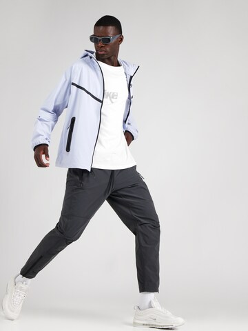 Nike Sportswear Between-season jacket in Blue