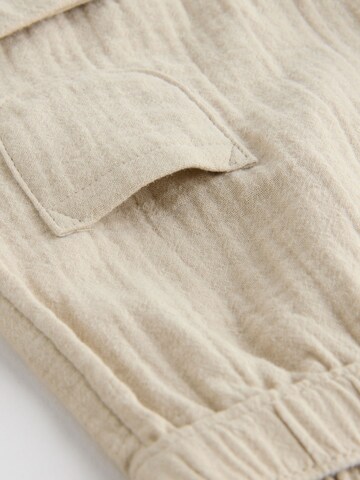 Set Next en beige