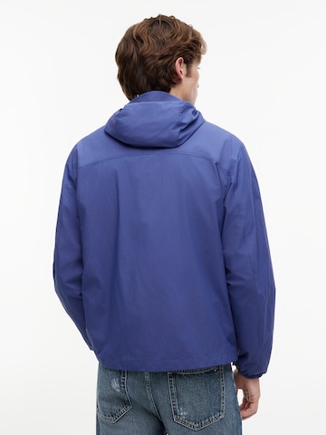 Tommy Jeans Tussenjas 'CHICAGO' in Blauw