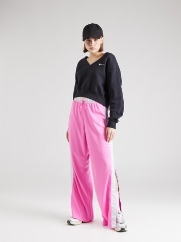 Nike Sportswear Loose fit Pants 'Air Breakaway' in Pink