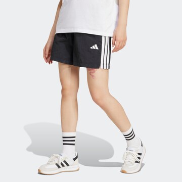 ADIDAS SPORTSWEAR Loose fit Sports trousers in Black: front