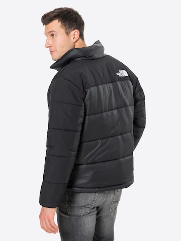 THE NORTH FACE Regular Fit Välikausitakki 'Himalayan' värissä musta