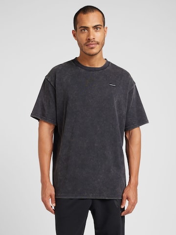 UNDER ARMOUR Funktionsskjorte i sort: forside