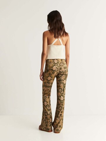 Scalpers Flared Pants in Brown