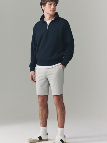 Slimfit Pantaloni chino di Next in beige