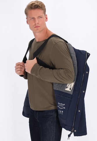 Veste fonctionnelle Schmuddelwedda en bleu