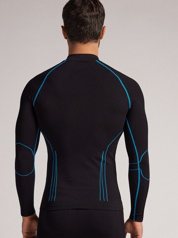 INTIMISSIMI Funktionsshirt in Schwarz