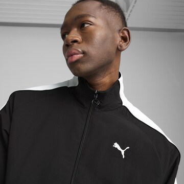 PUMA Trainingsjacke 'T7' in Schwarz