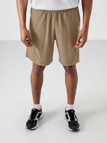 Tommy Life Tapered Hose‌‌‌‌‌‌‌‌‌‌ in Grün: Vorderseite