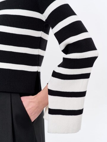 Blue Shadow Sweater in Black