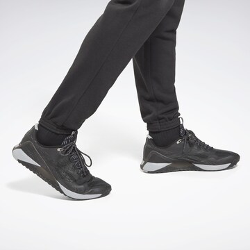 Reebok Tapered Sportbroek in Zwart