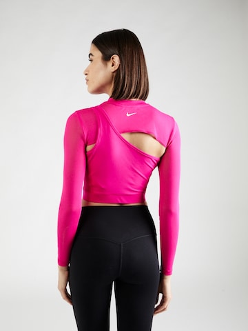 NIKE - Camiseta funcional en rosa