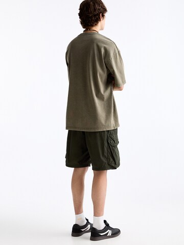 Regular Pantalon cargo Pull&Bear en vert