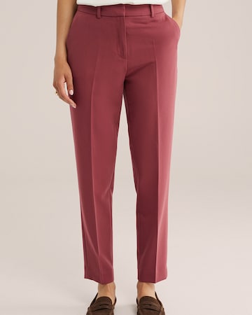 Slimfit Pantaloni con piega frontale di WE Fashion in rosa: frontale