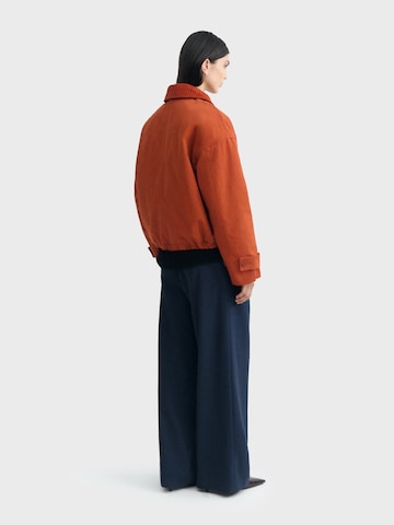 Thinking MU Přechodná bunda 'Norma' – oranžová
