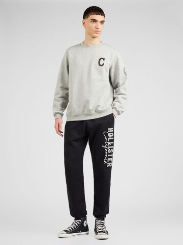 Tapered Pantaloni de la HOLLISTER pe negru