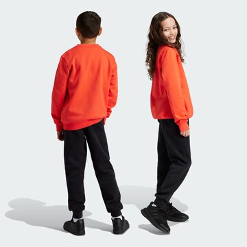ADIDAS SPORTSWEAR Trainingsanzug 'Essentials' in Rot