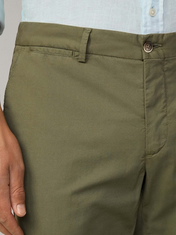 Slimfit Pantaloni chino 'Gmd Texture' di Hackett London in verde