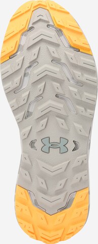 UNDER ARMOUR Juoksukengät 'Charged Bandit TR 2' värissä harmaa